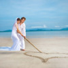 Couple on beach with heart.jpg image